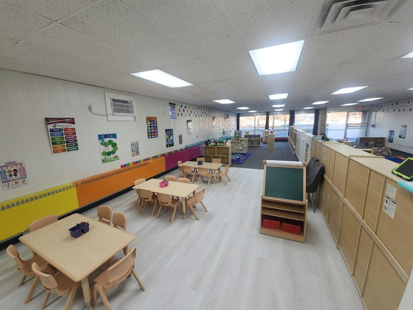 Classroom with small tables and chairs