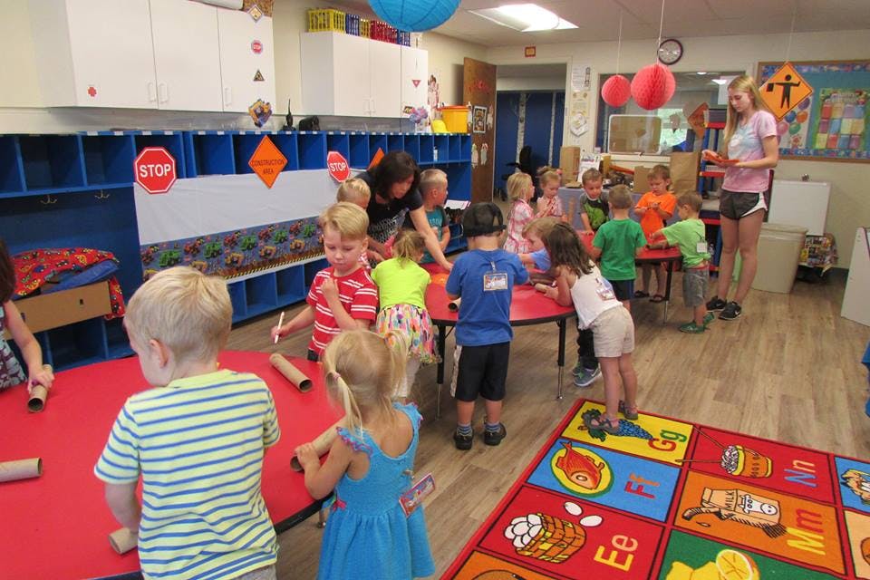 Children and adults in a classroom