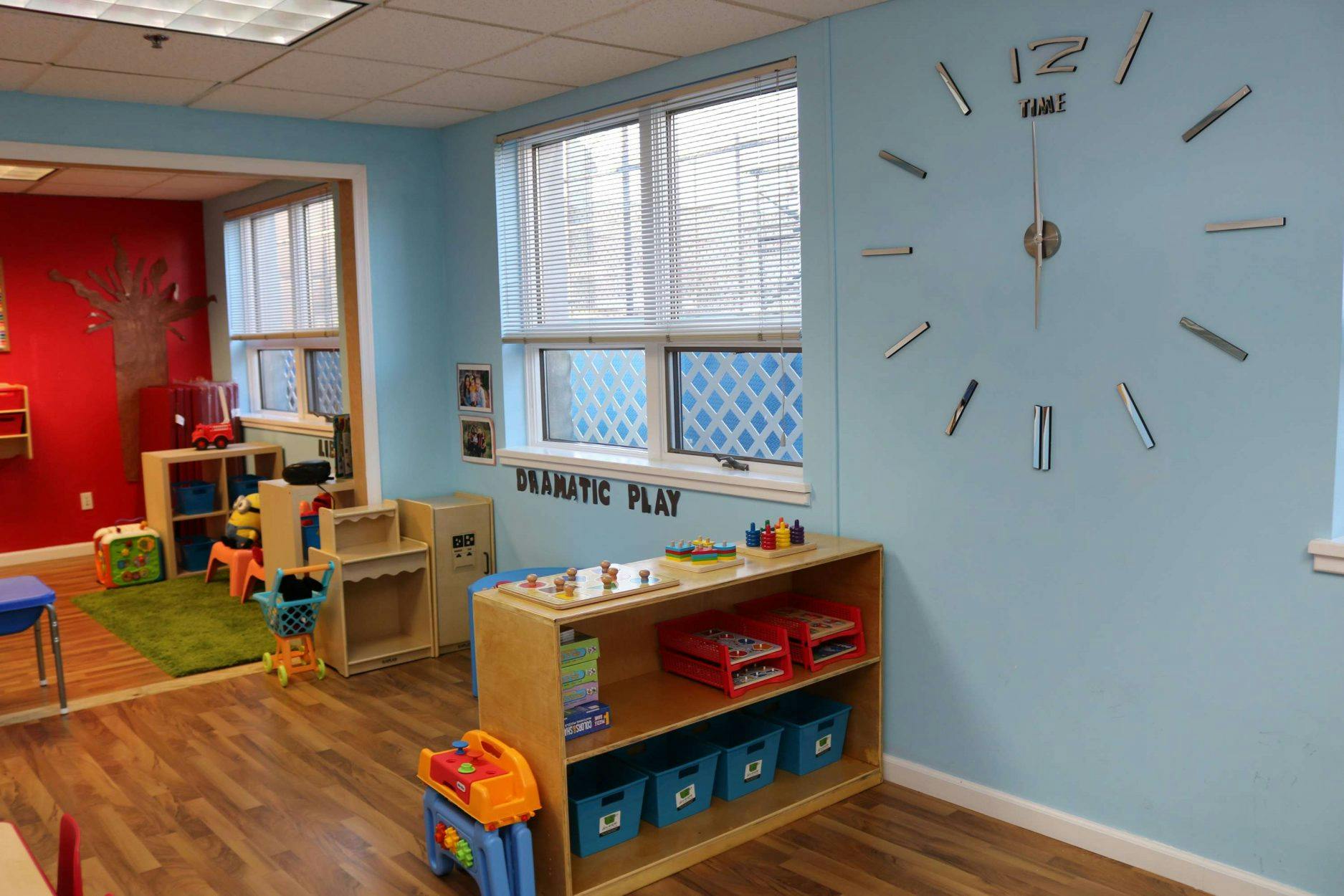 Classroom with play area and large wall clock