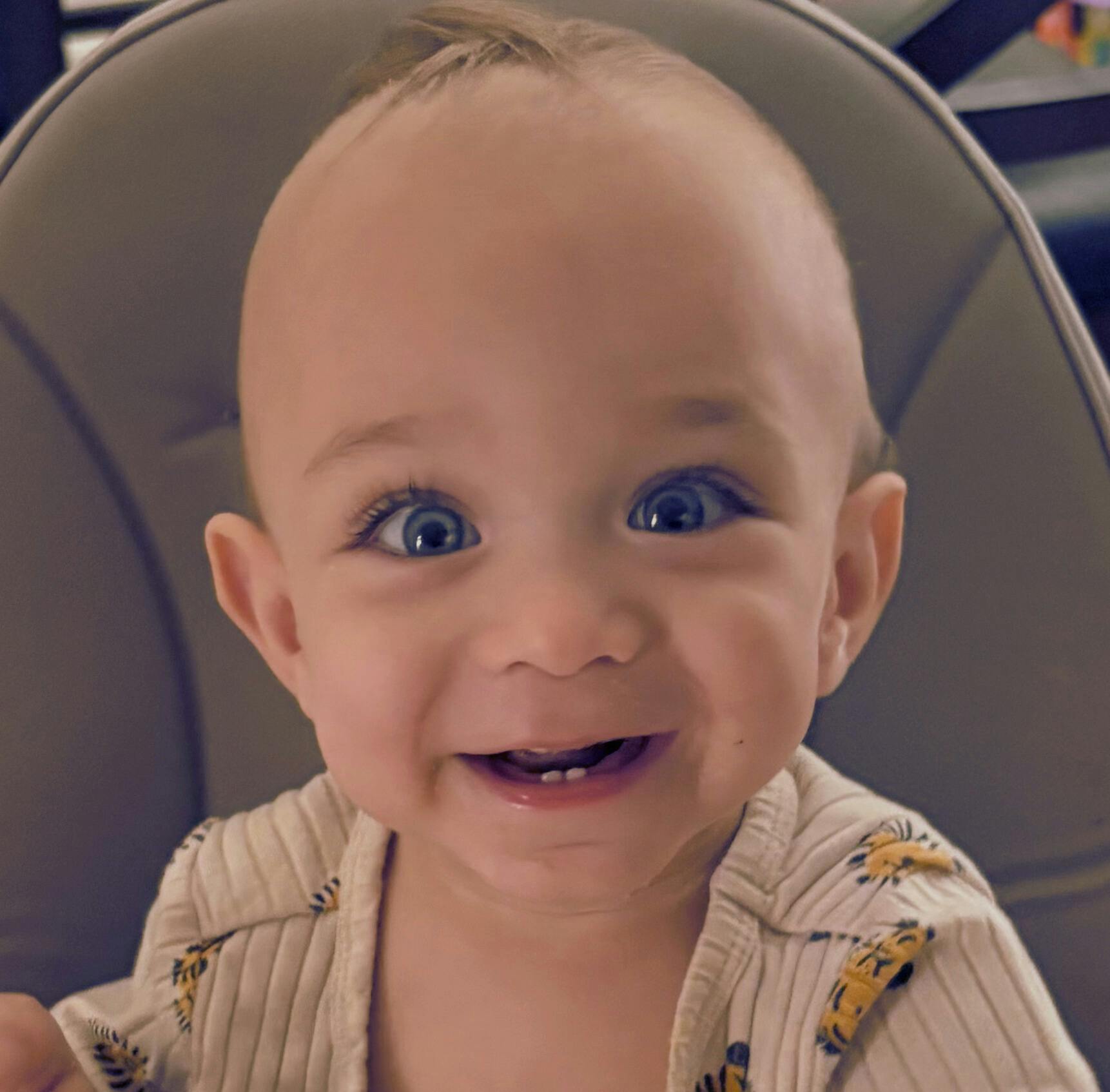 Child with wide eyes and open mouth