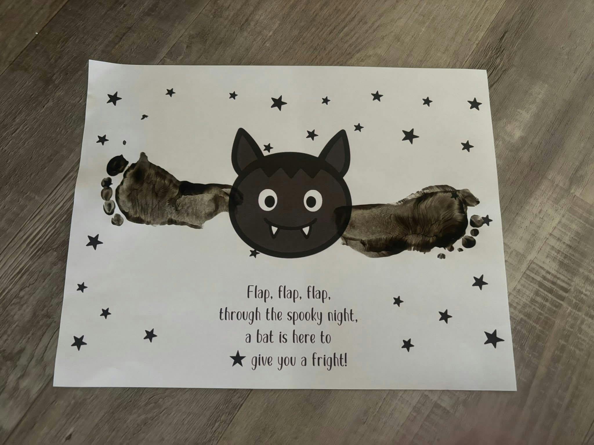 Bat craft made from child's footprints with text