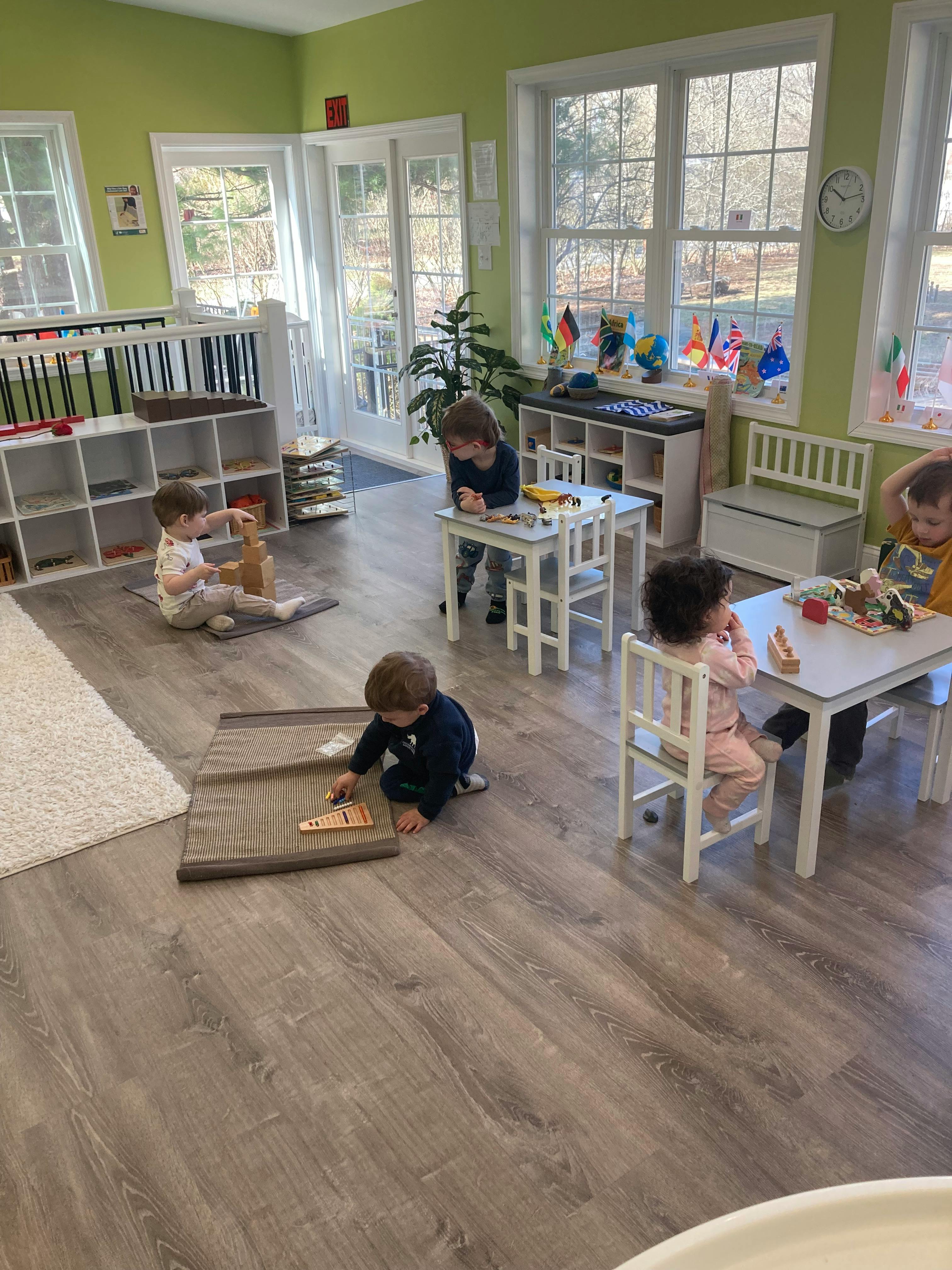 Children playing with toys in a classroom