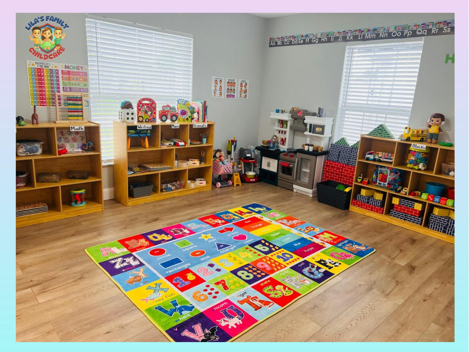 Childcare classroom with colorful rug, play kitchen, and wooden toy shelves