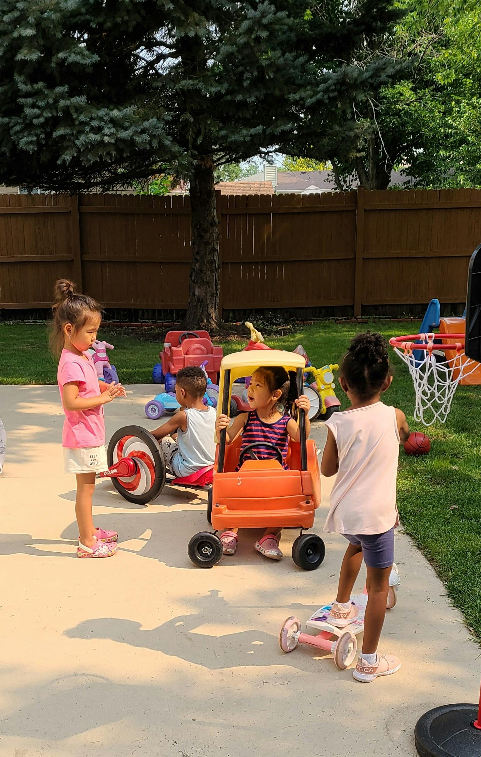 Children playing with toys outdoors