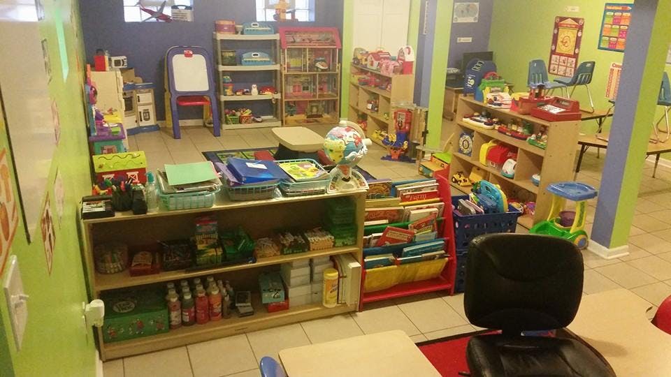 Playroom with shelves of toys and books