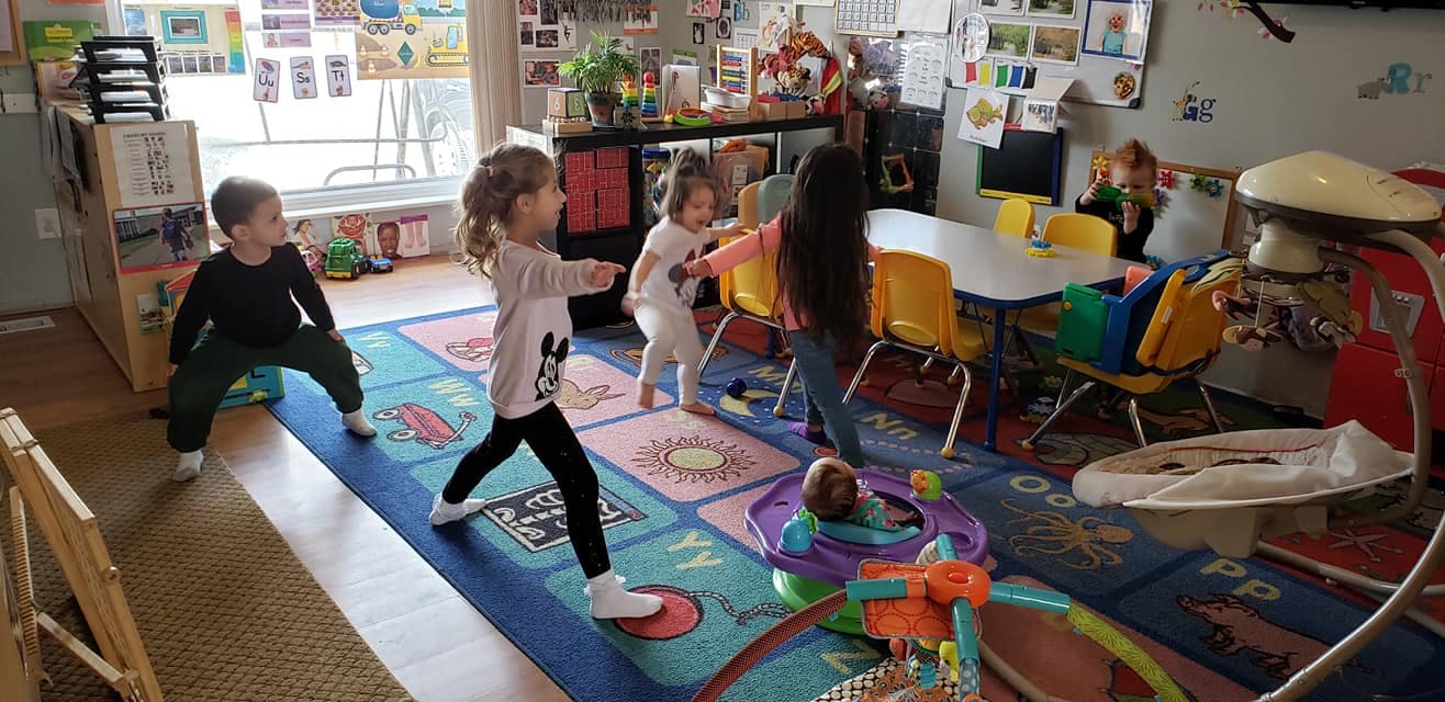 Children playing in a classroom