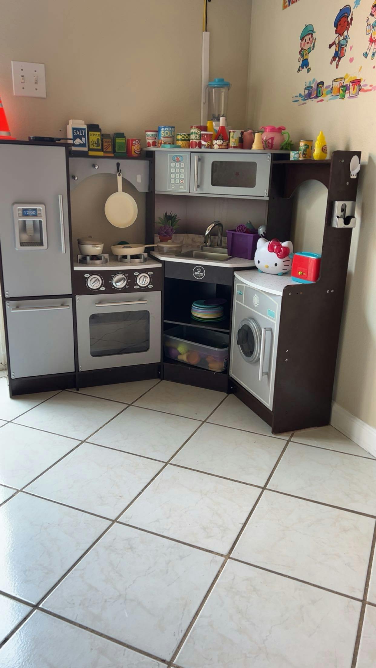 Toy kitchen set for children with play appliances and accessories