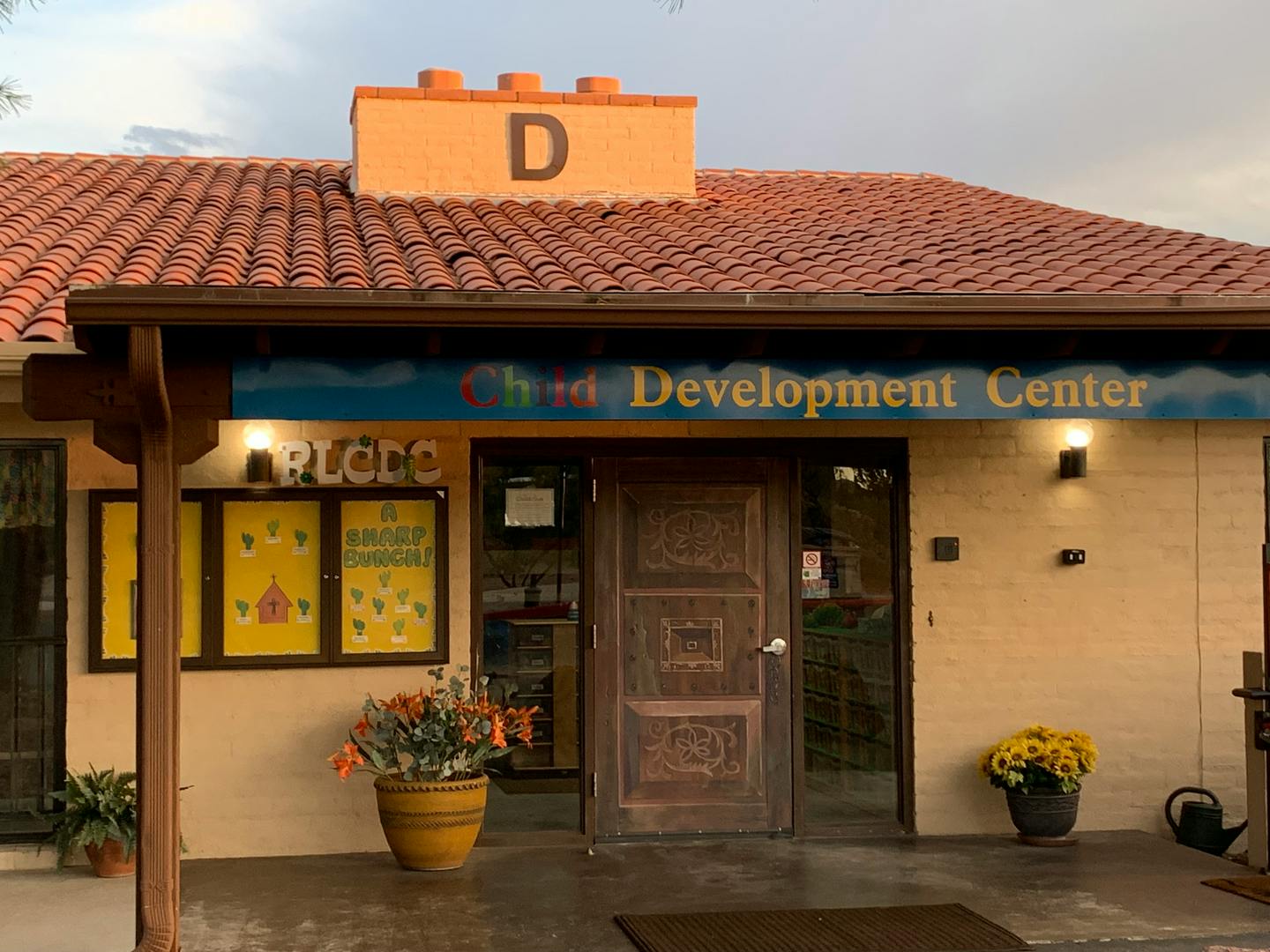 Entrance to a building with a sign that reads "Child Development Center"