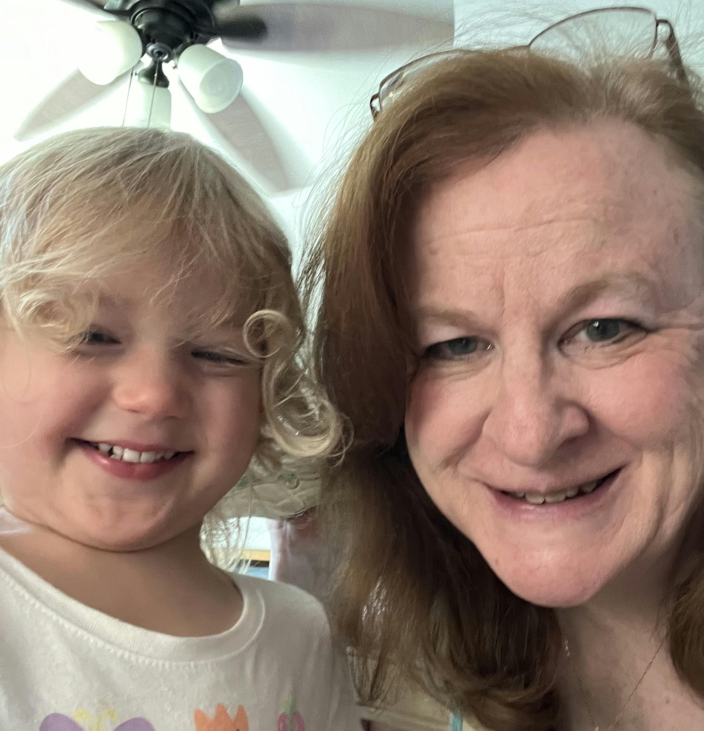 Adult and child smiling