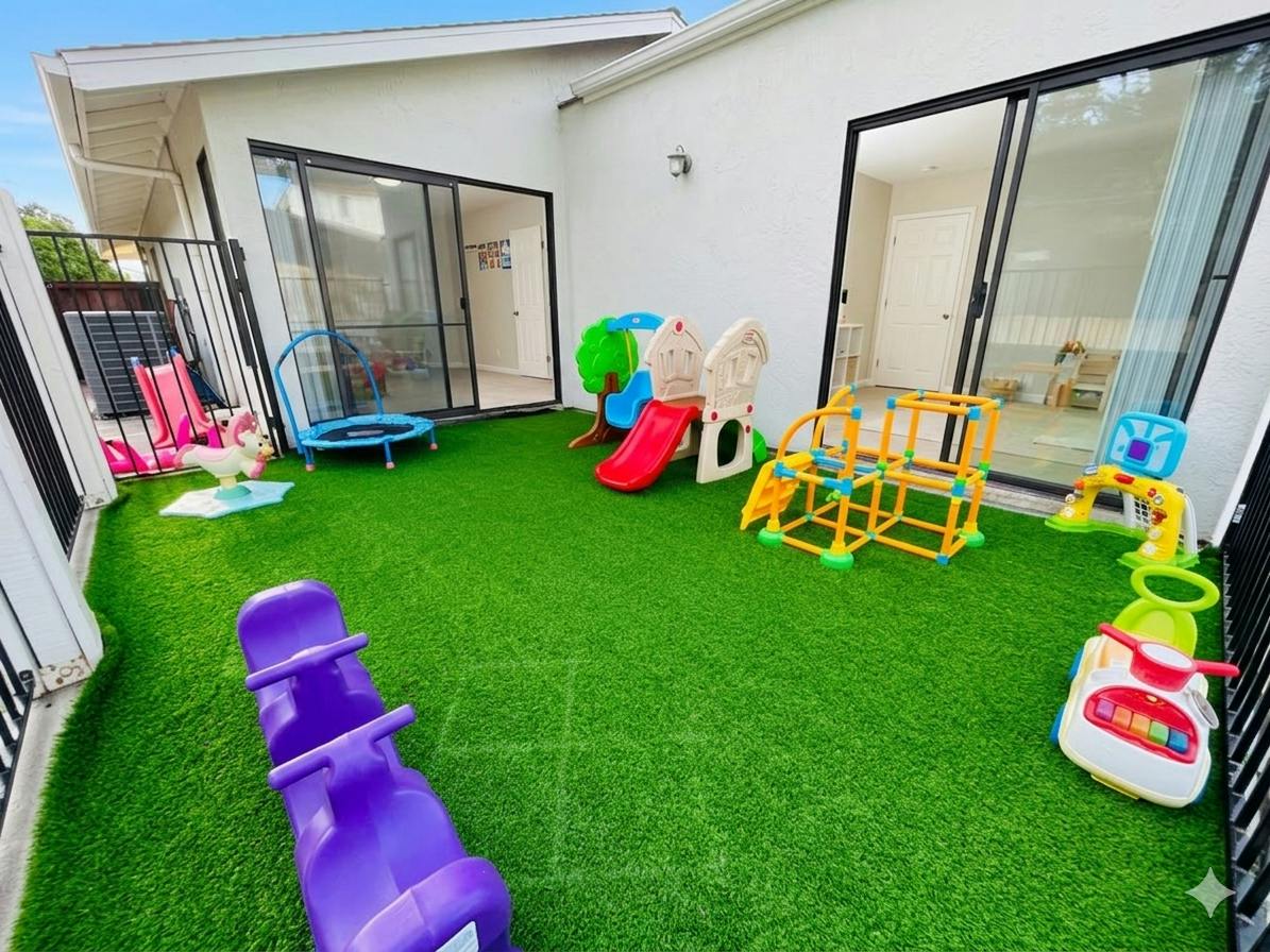 Playground equipment and toys on artificial turf in a backyard