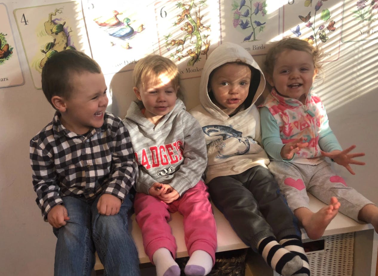 Four children sitting together