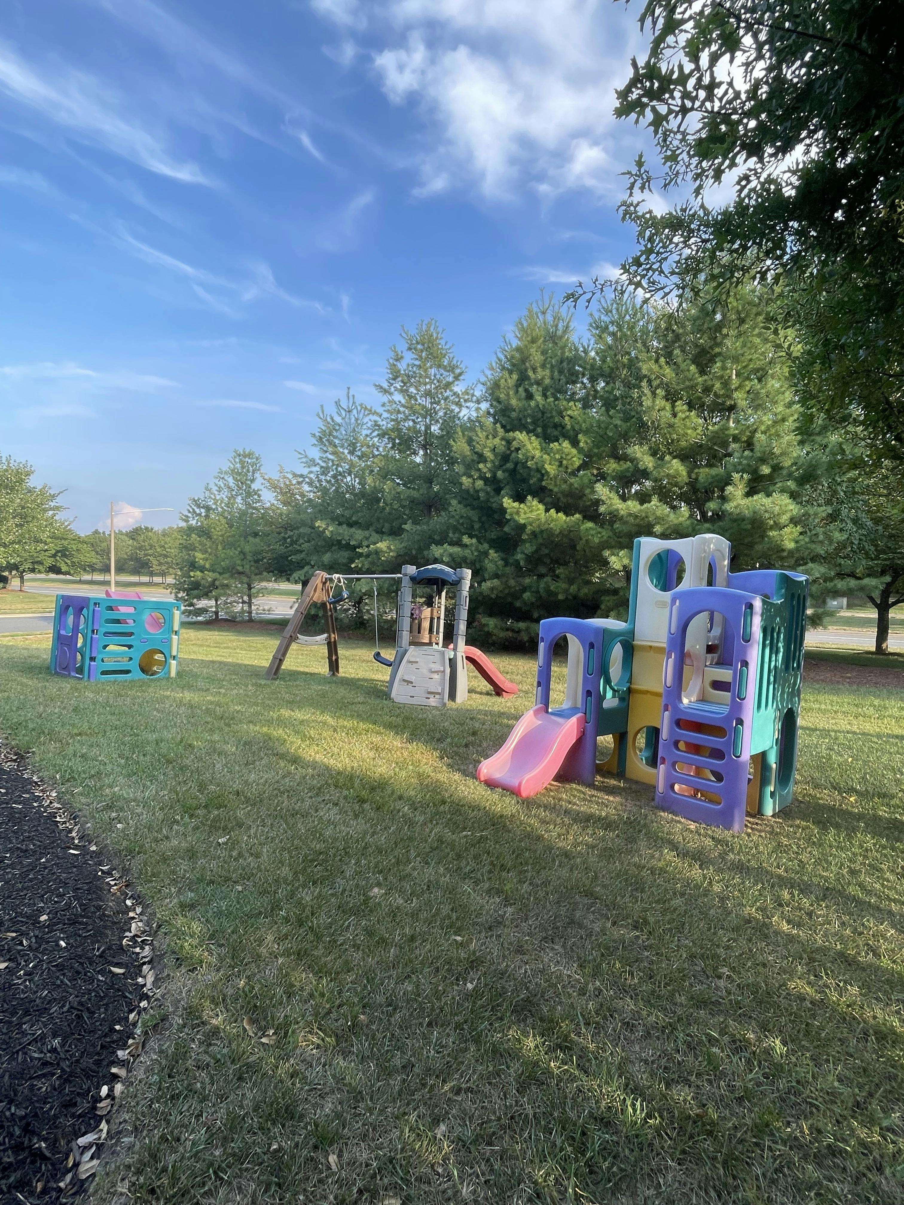 Outdoor playground with slides and swings