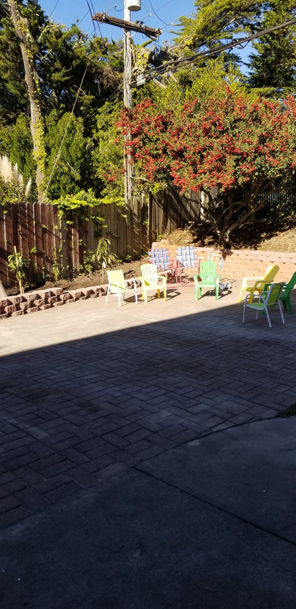 Patio with colorful chairs arranged in a circle