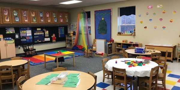 Classroom with small tables and chairs