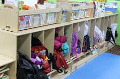 Cubby storage with backpacks and coats in a classroom
