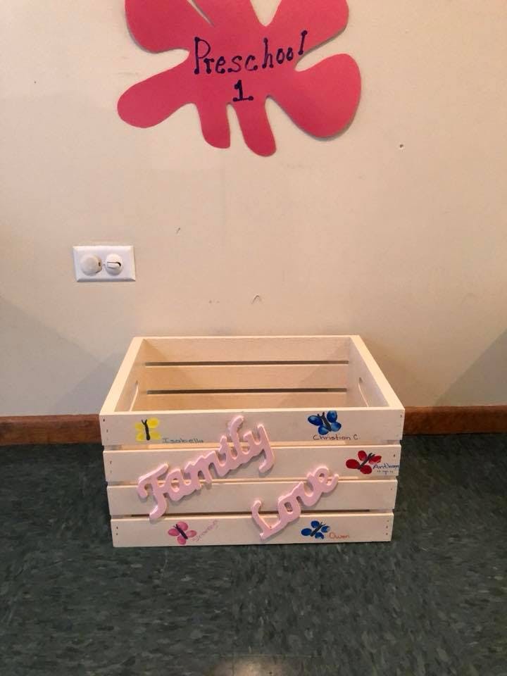 Wooden crate with "Family" and "Love" written on it