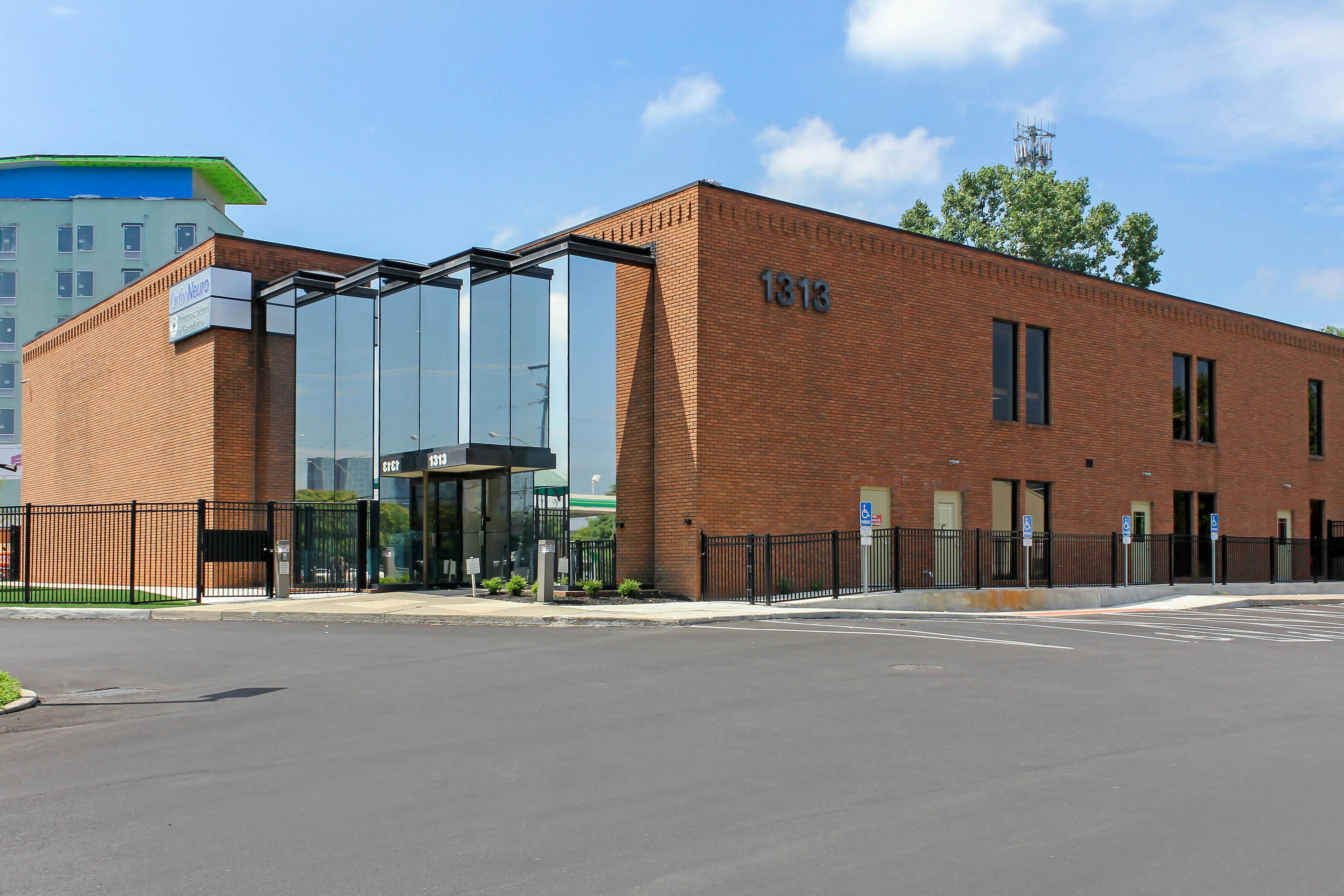 Brick building with a glass entrance, 