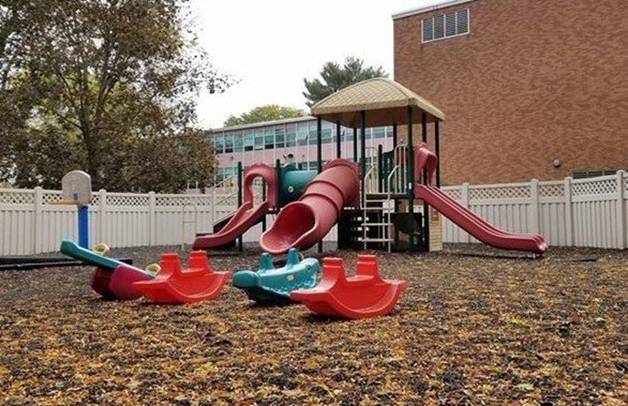 Playground with slides and spring riders
