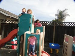 Children on a playground structure
