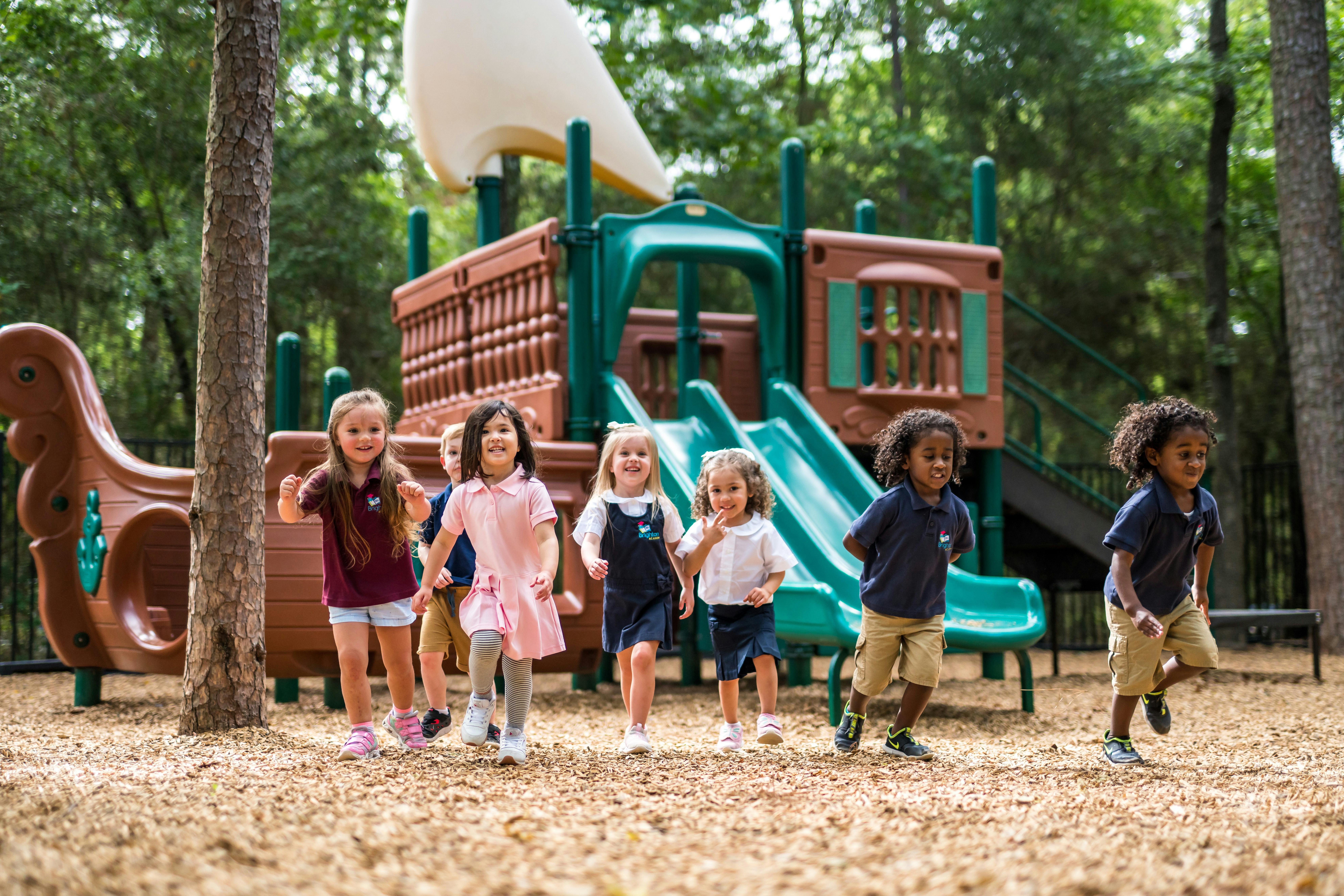Children running on a playground