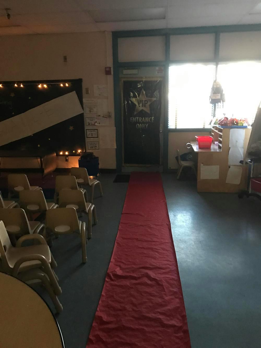 Red carpet leading to a door with a star and "ENTRANCE" text
