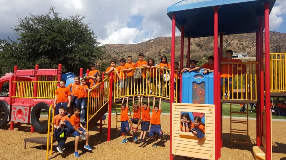 Group of people on a playground structure