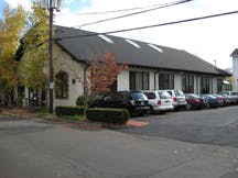Building with parked cars