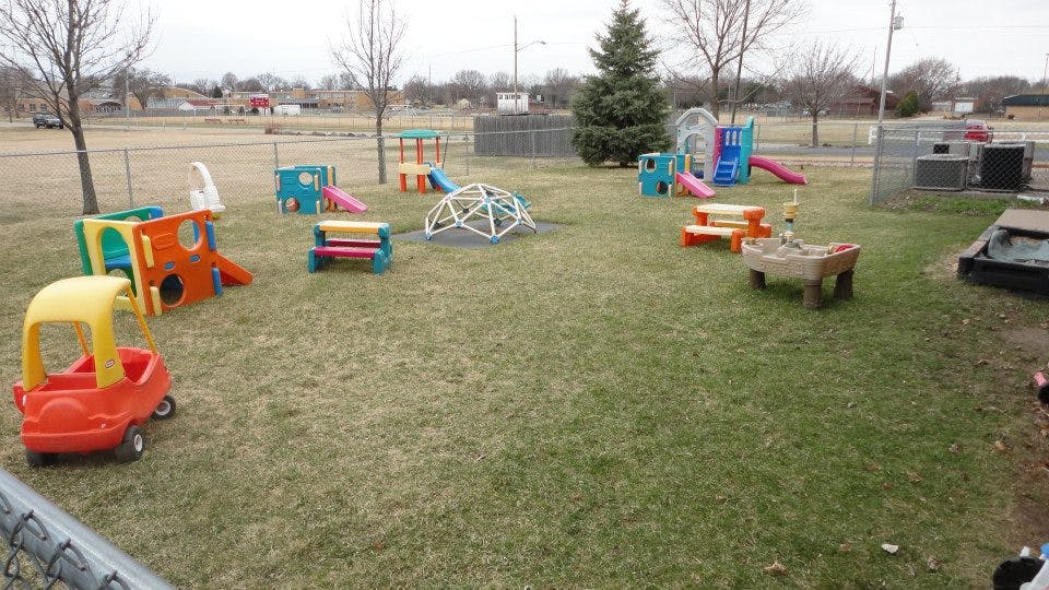 Outdoor playground with various colorful play structures