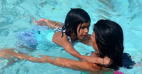 Two people in a swimming pool