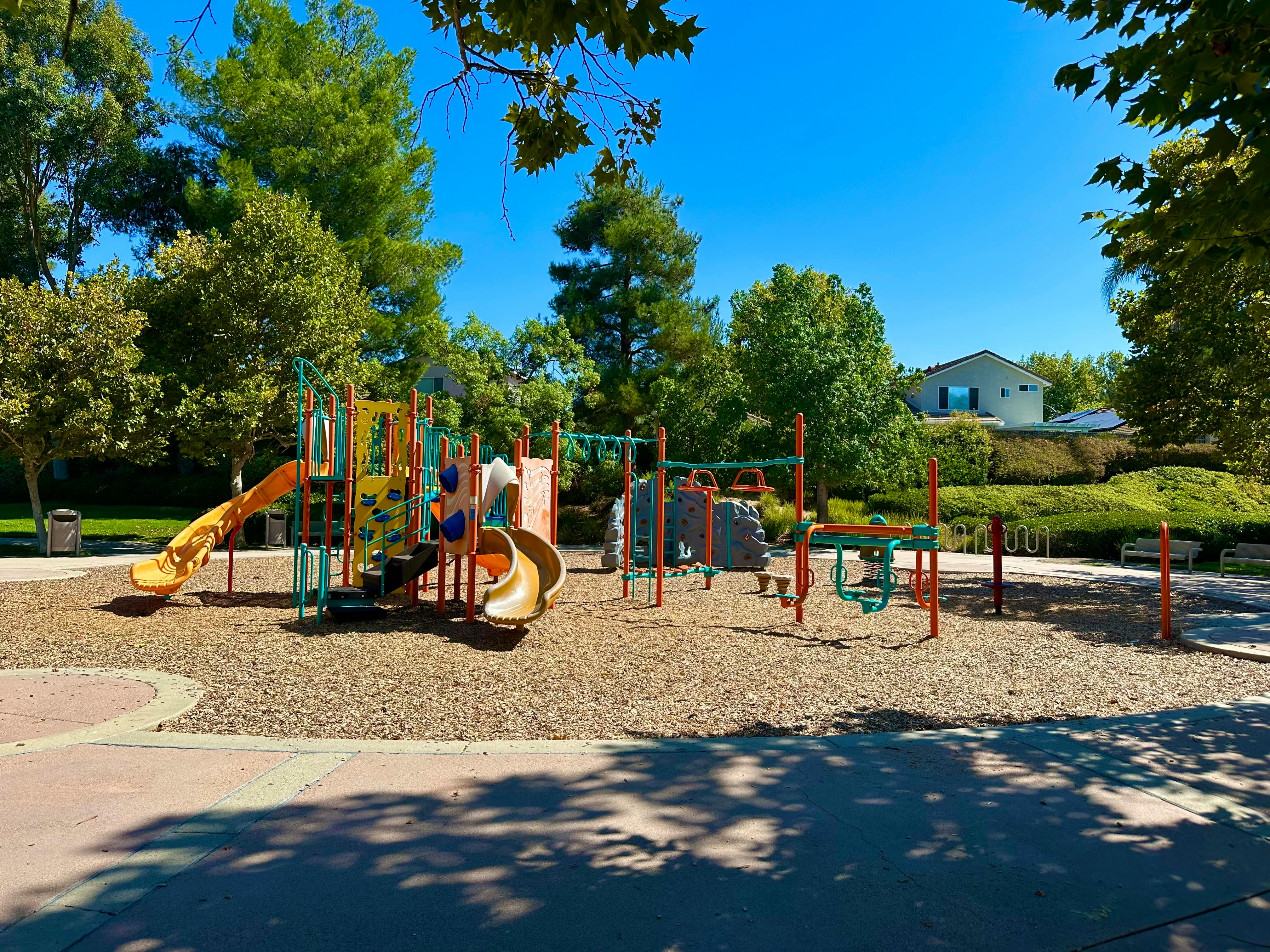 Empty playground with slides and climbing structures