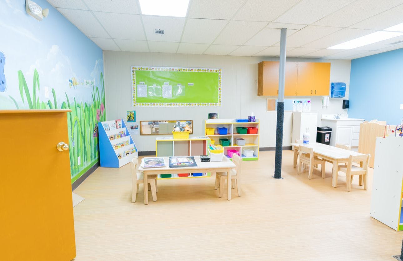Classroom with small tables and chairs for children