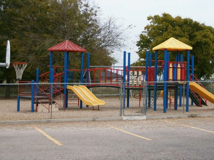 Playground with slides and climbing structures
