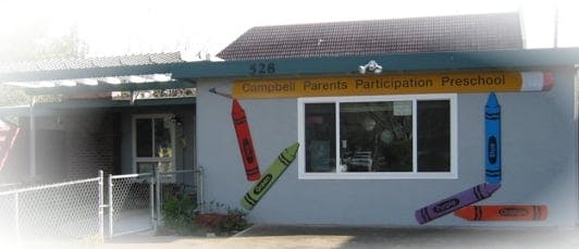 Building exterior with large crayon and pencil decorations