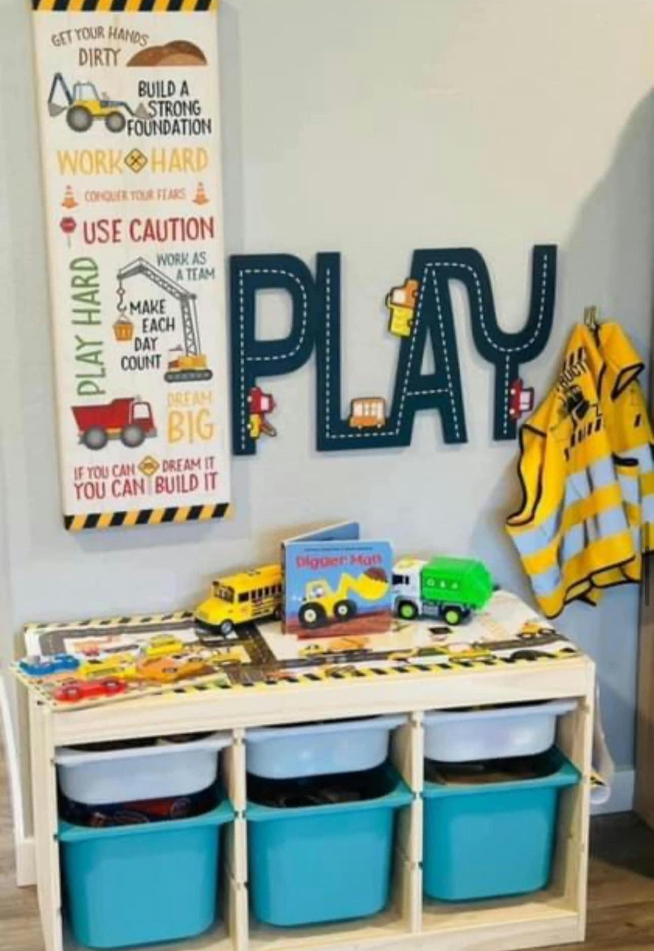 Children's room with construction-themed decor and toy storage