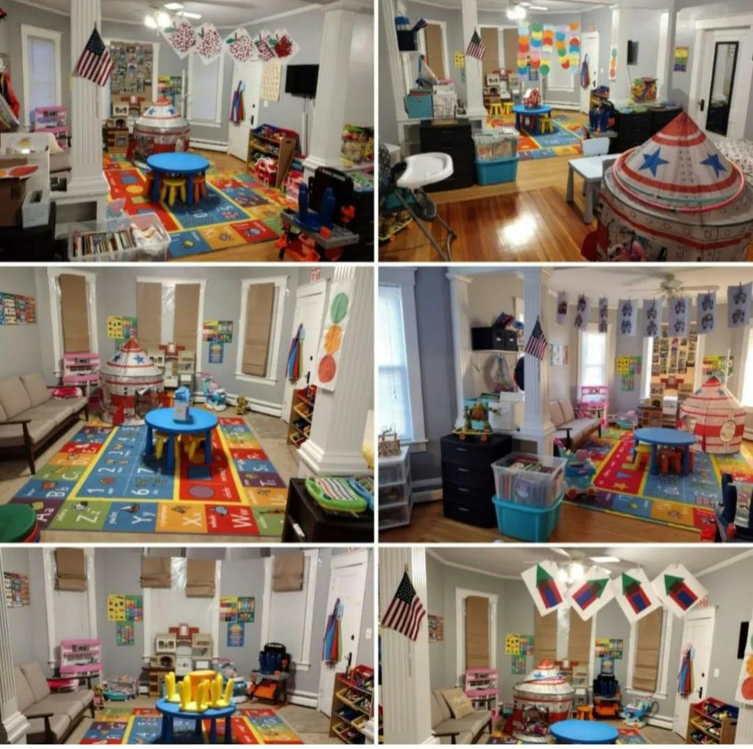 Playroom with colorful rug, small tables, and various toys