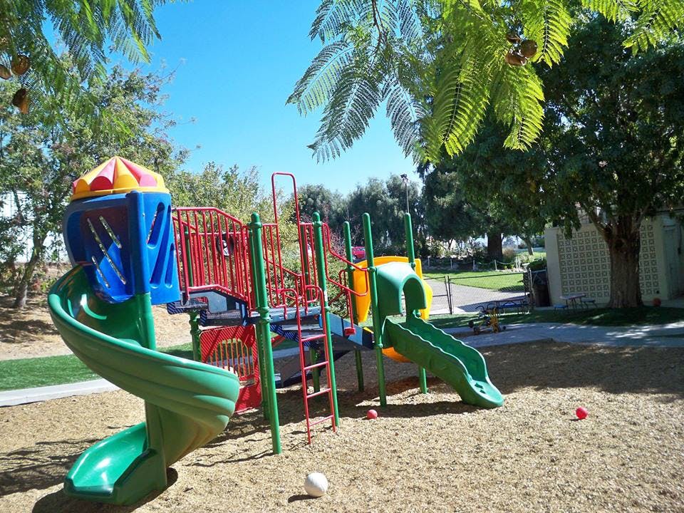 Playground with slides and climbing structures