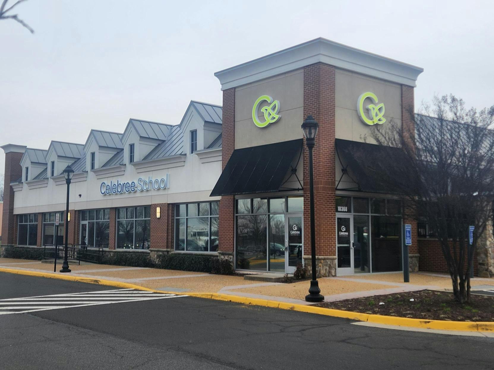 Exterior of a commercial building with "Children's Dental" and "C&C" signs