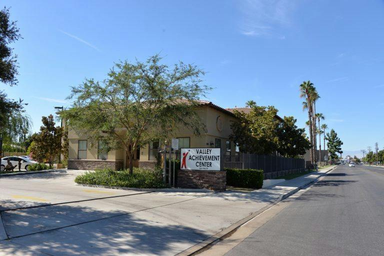 Building with a sign that reads "Valley Achievement Center"