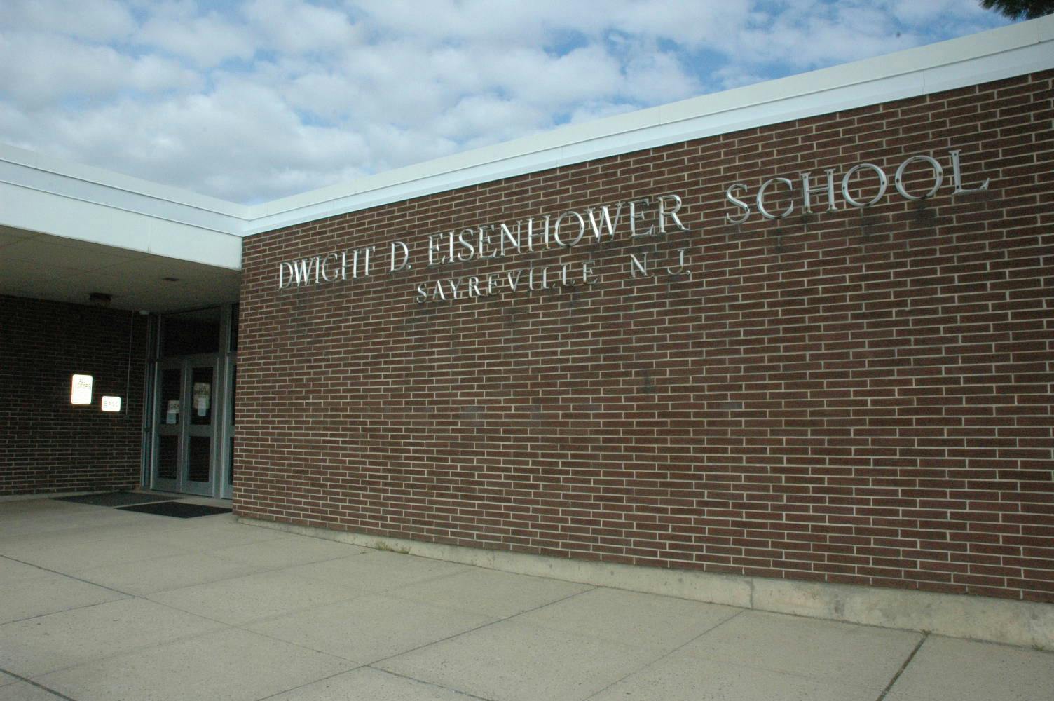 Dwight D Eisenhower School sign on a brick building