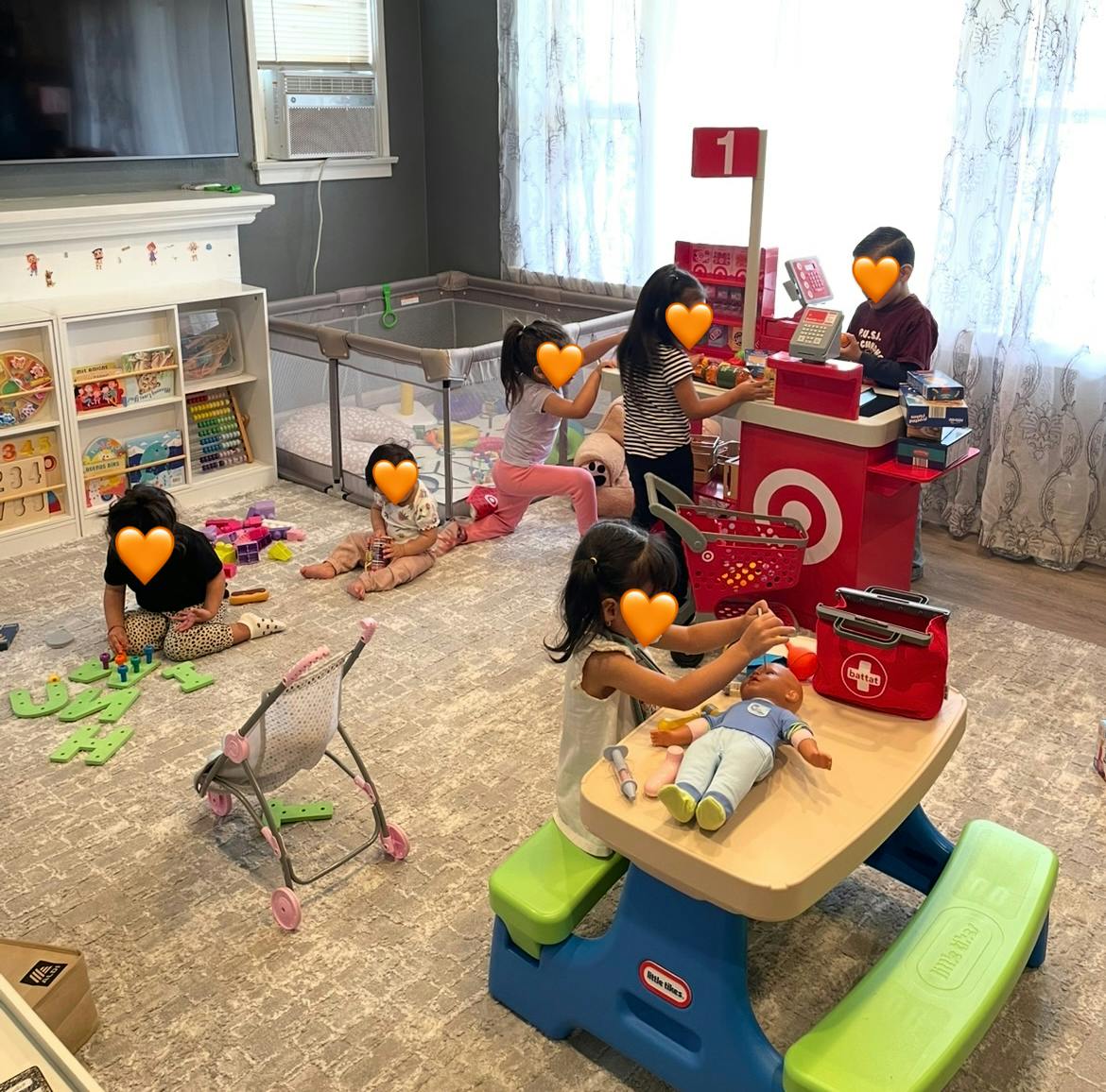 Children playing with toys in a room