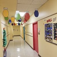 School hallway decorated with colorful paper cutouts