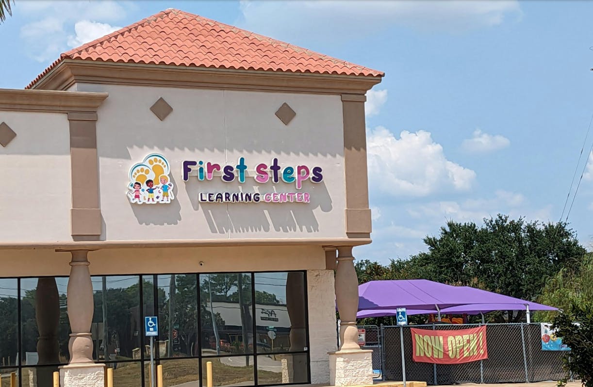 First Steps Learning Center sign on a building facade