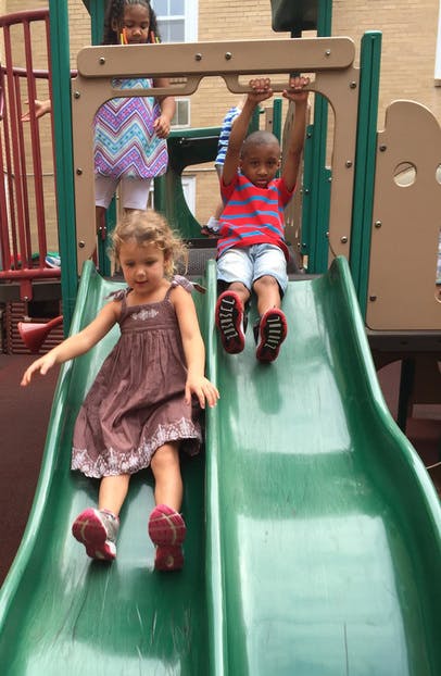 Children on a playground slide