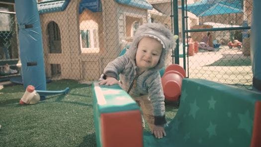 Child on a playground structure