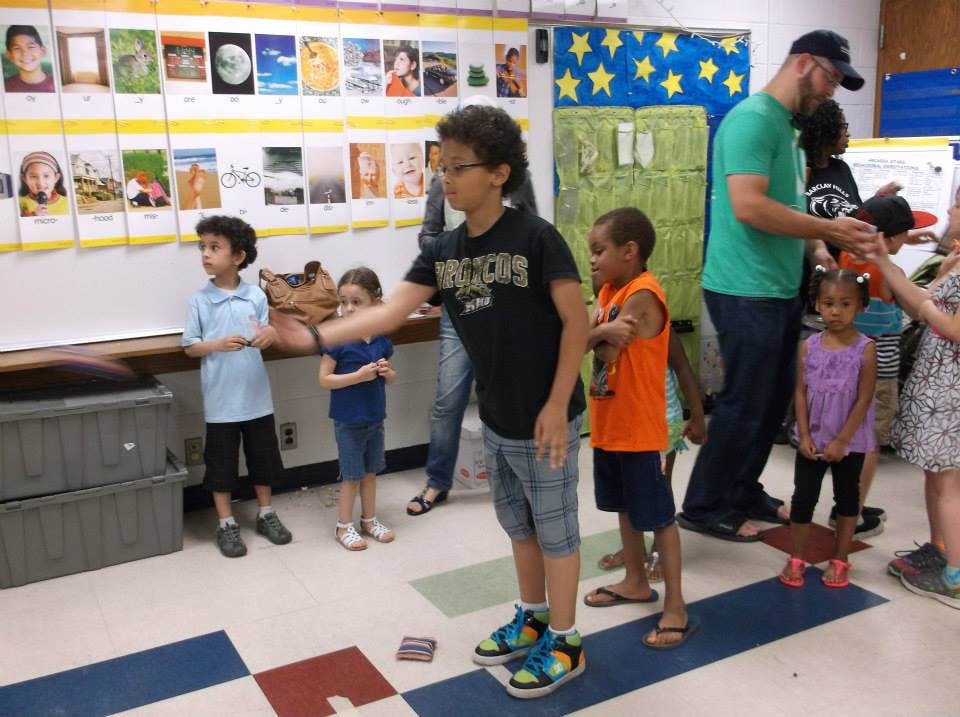 Children and adults in a classroom