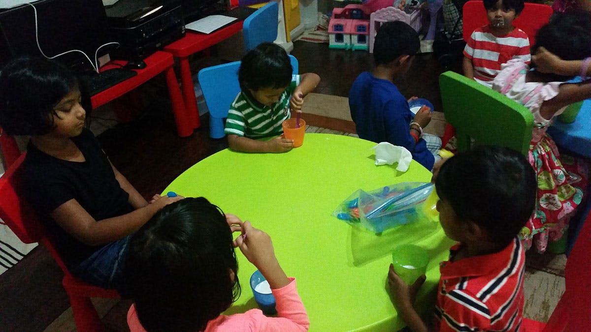 Children sitting around a table