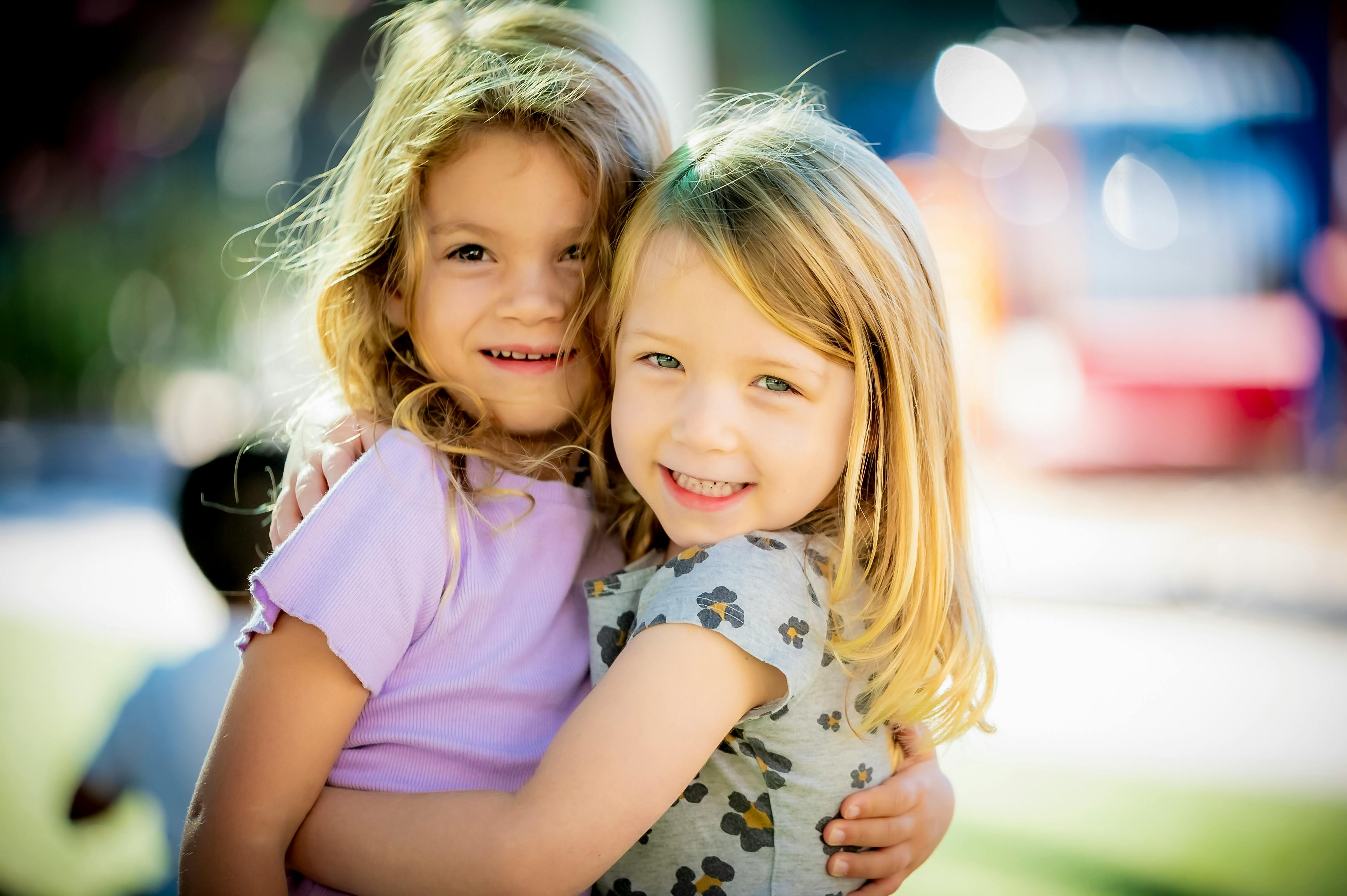 Two children hugging
