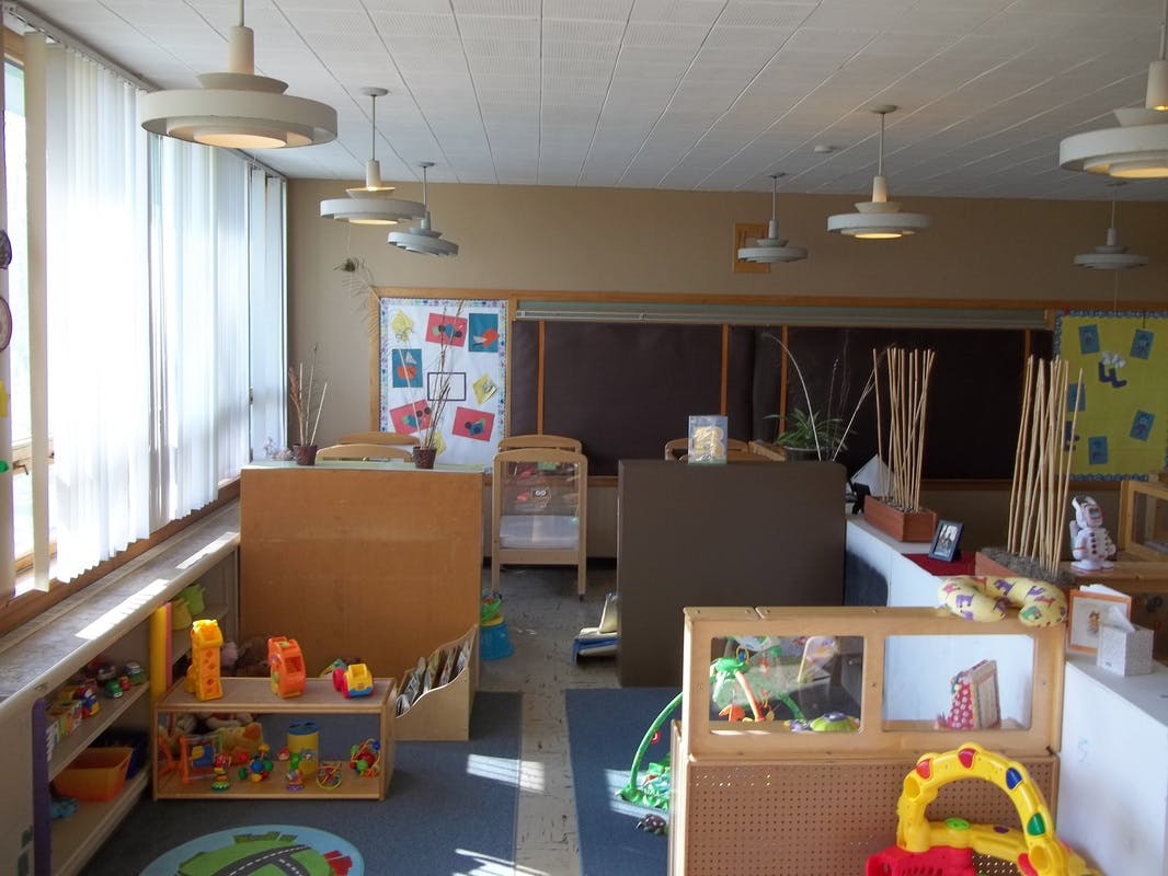 Empty classroom with toys and furniture