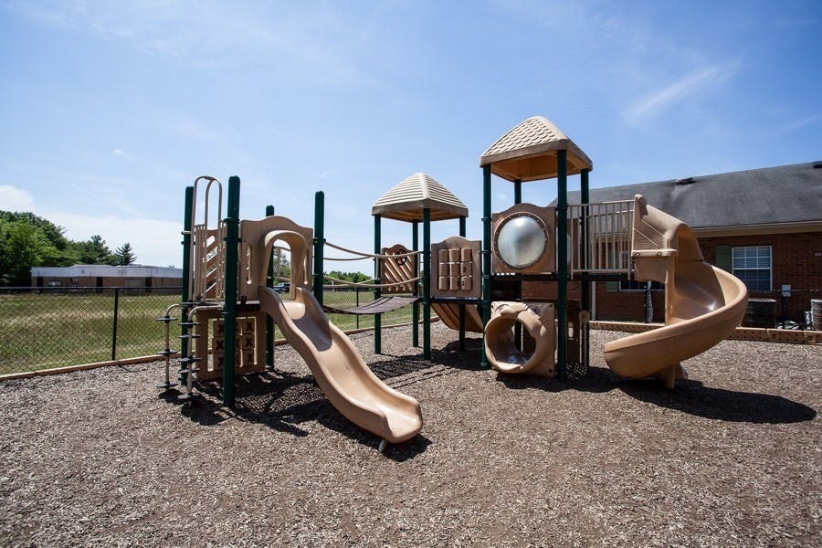 Playground with slides and climbing structures