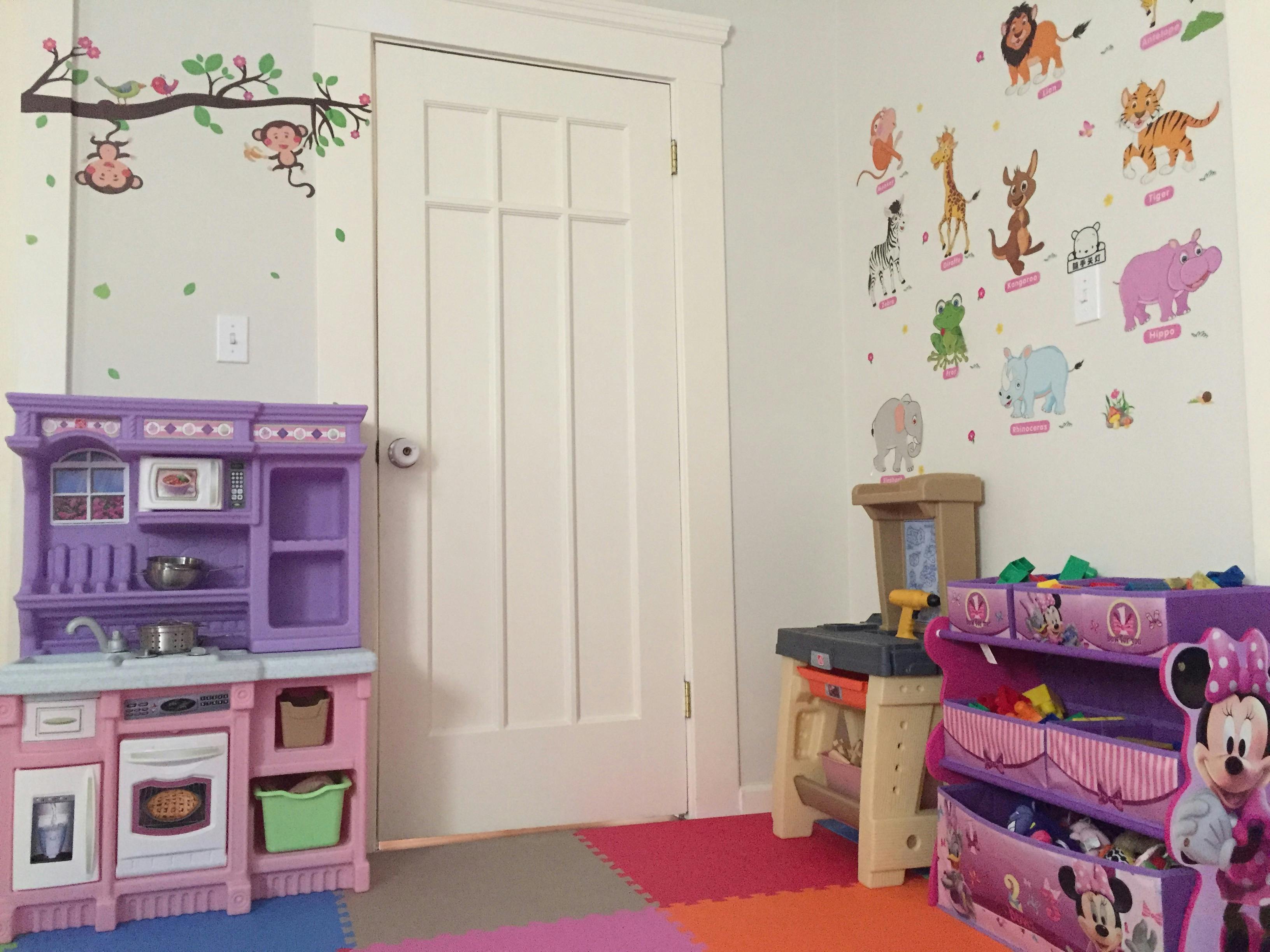 Play kitchen and toy storage in a child's room